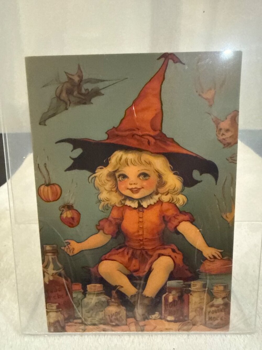 Vintage Halloween Witch Postcard With Blonde Girl Red Hat Bottles Pumpkins & Bat